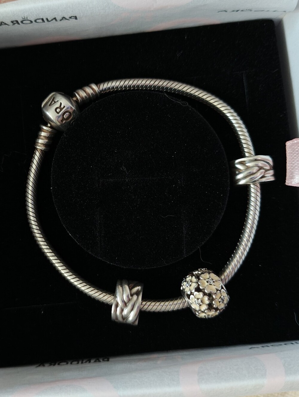 Pandora Silver Bracelet with Floral Charm and Two Braided Clip Charms